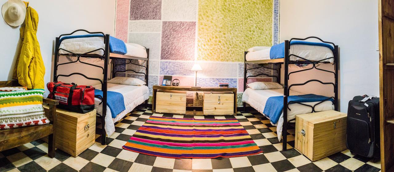 Cama en habitación femenina compartida de 4 camas